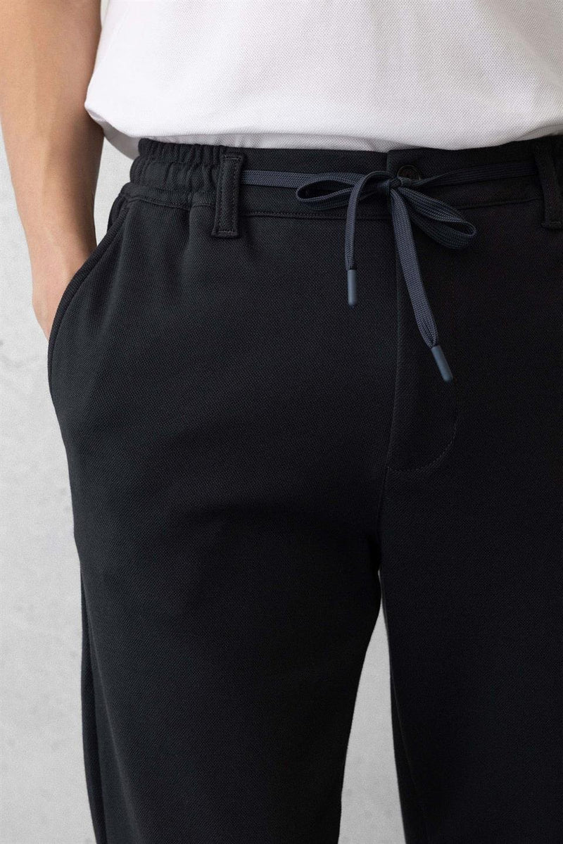 Pantalon Homme Akira en Maille Piqué Stretch