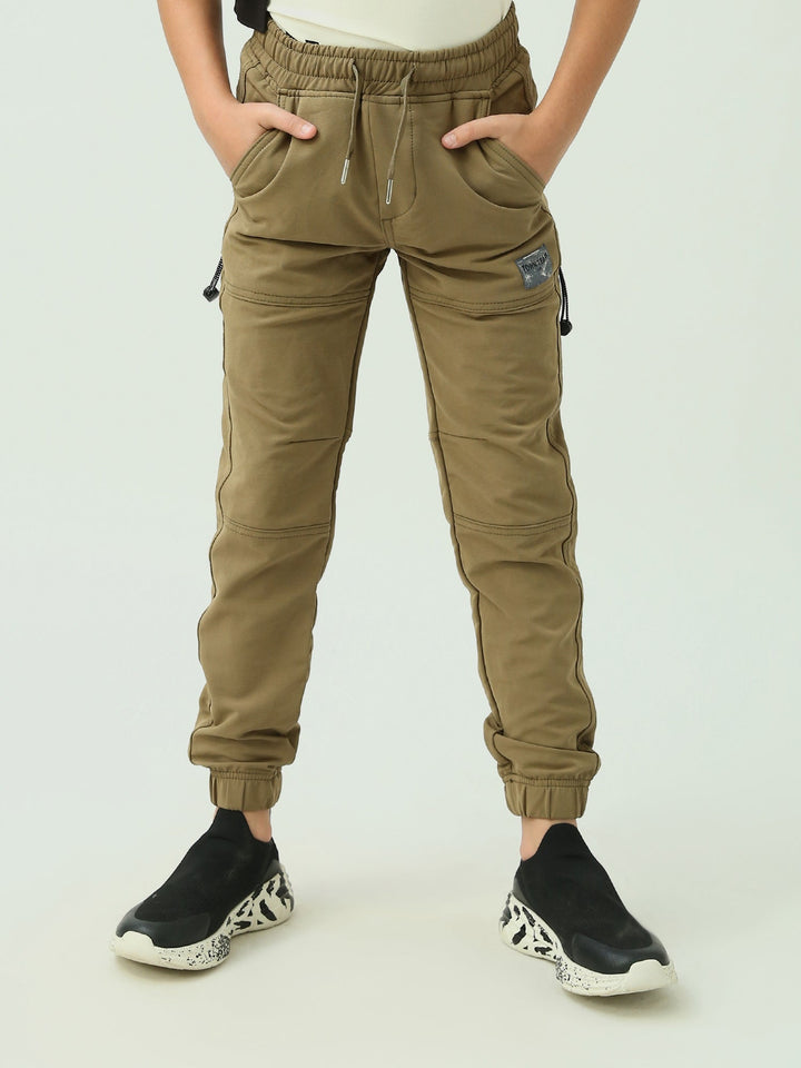 Pantalon de sport garçon à taille élastique avec poches latérales au design confortable - JOG23WGPS24242TB1