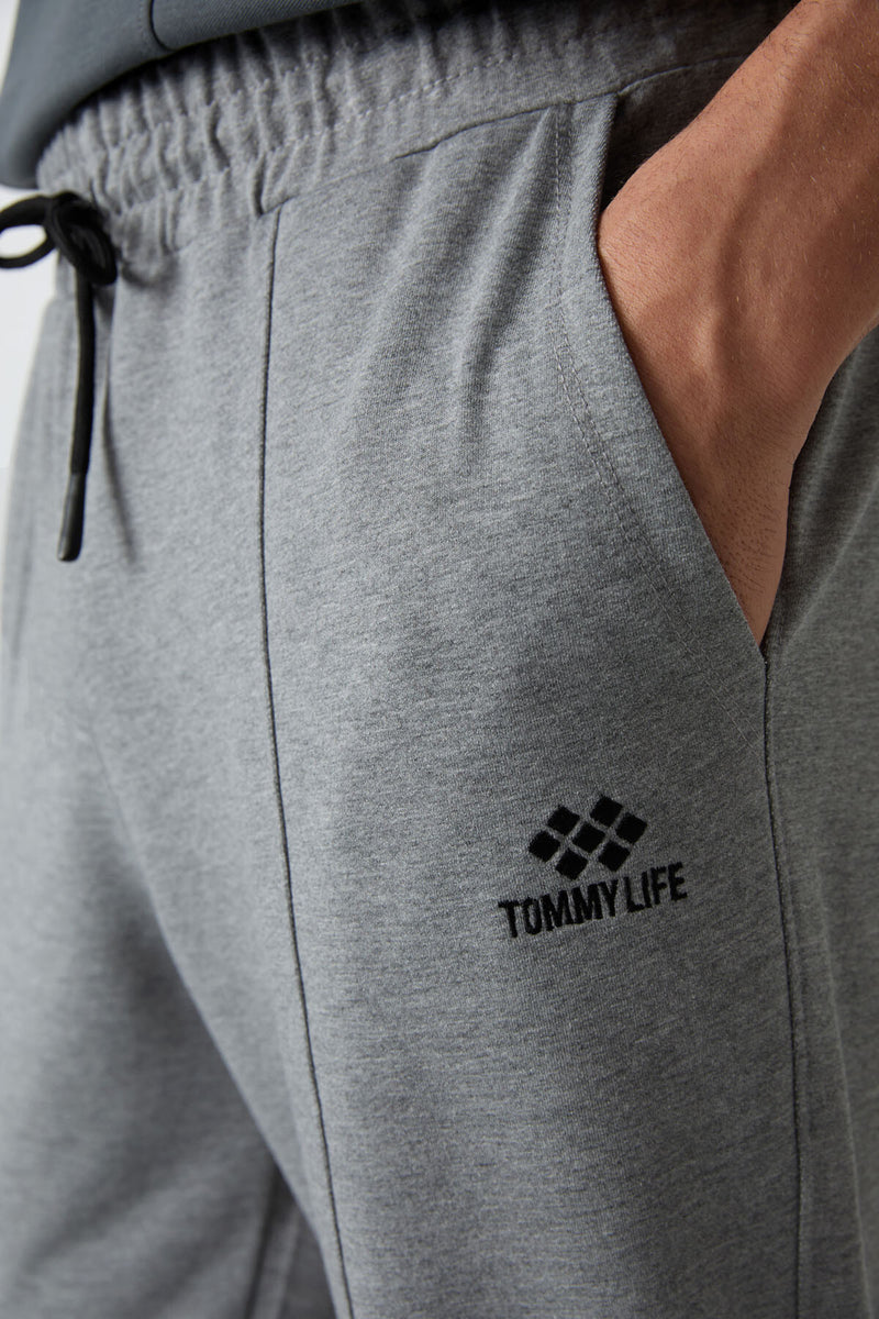 Jogging homme en coton doux, confort fit avec broderie
