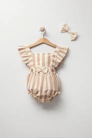 Barboteuse bébé fille à rayures avec nœud