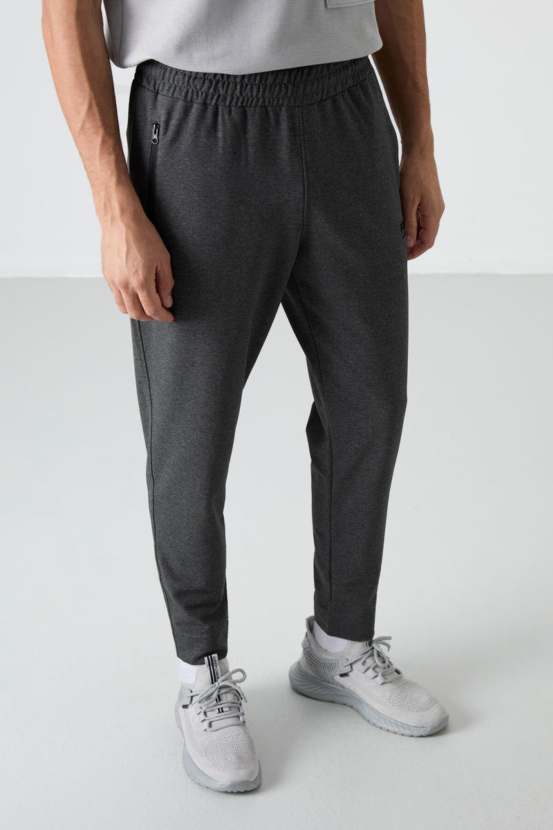 Jogging homme avec taille élastique et fermetures éclair
