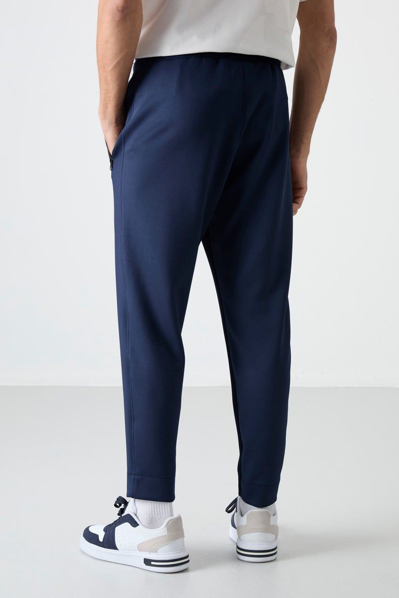 Jogging homme avec taille élastique et fermetures éclair
