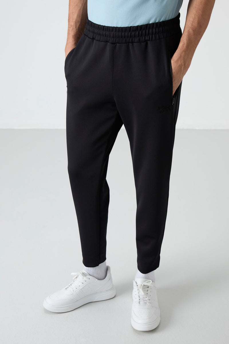Jogging homme avec taille élastique et fermetures éclair